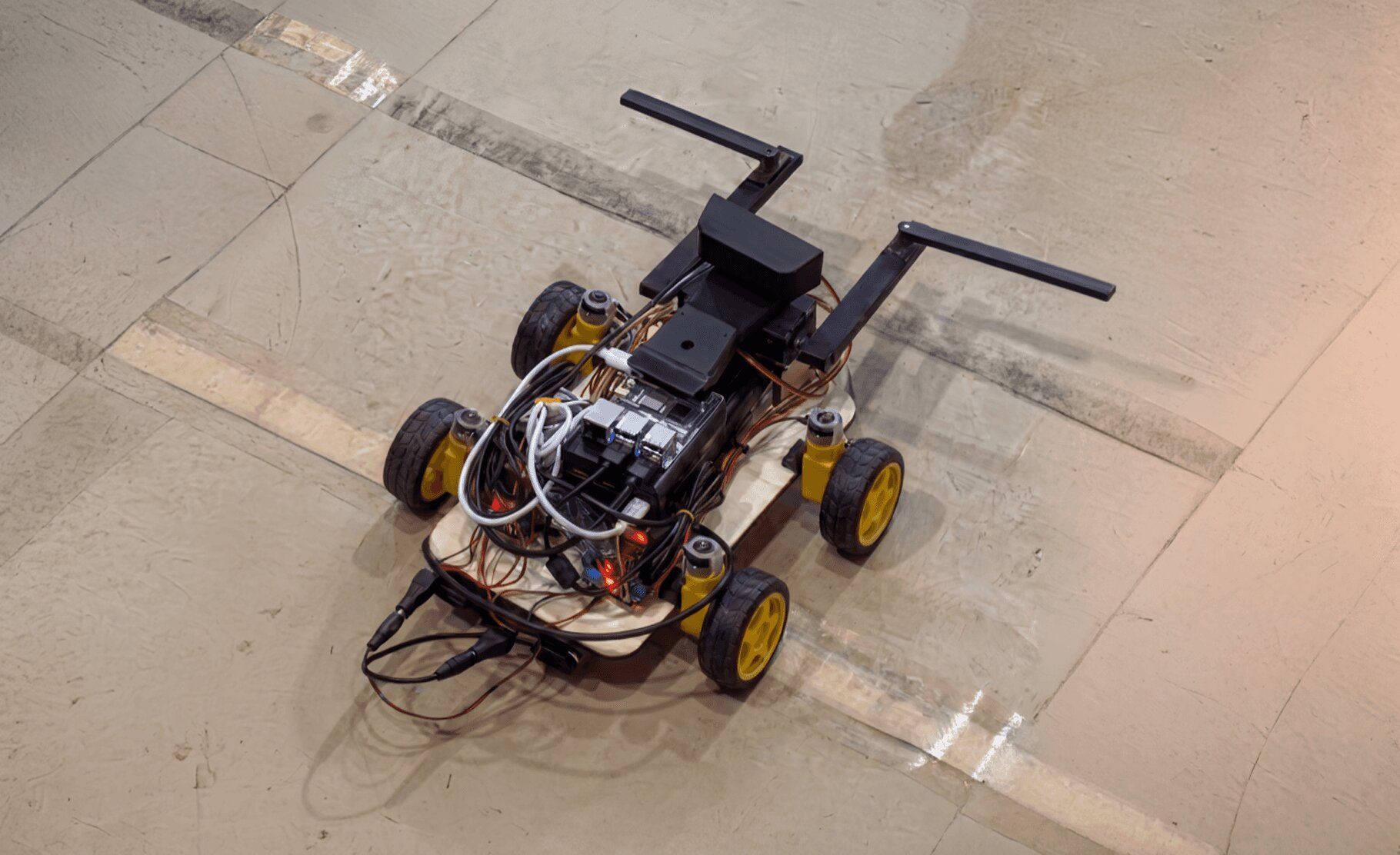 Trash collection robot chassis with robotic arm and electronics