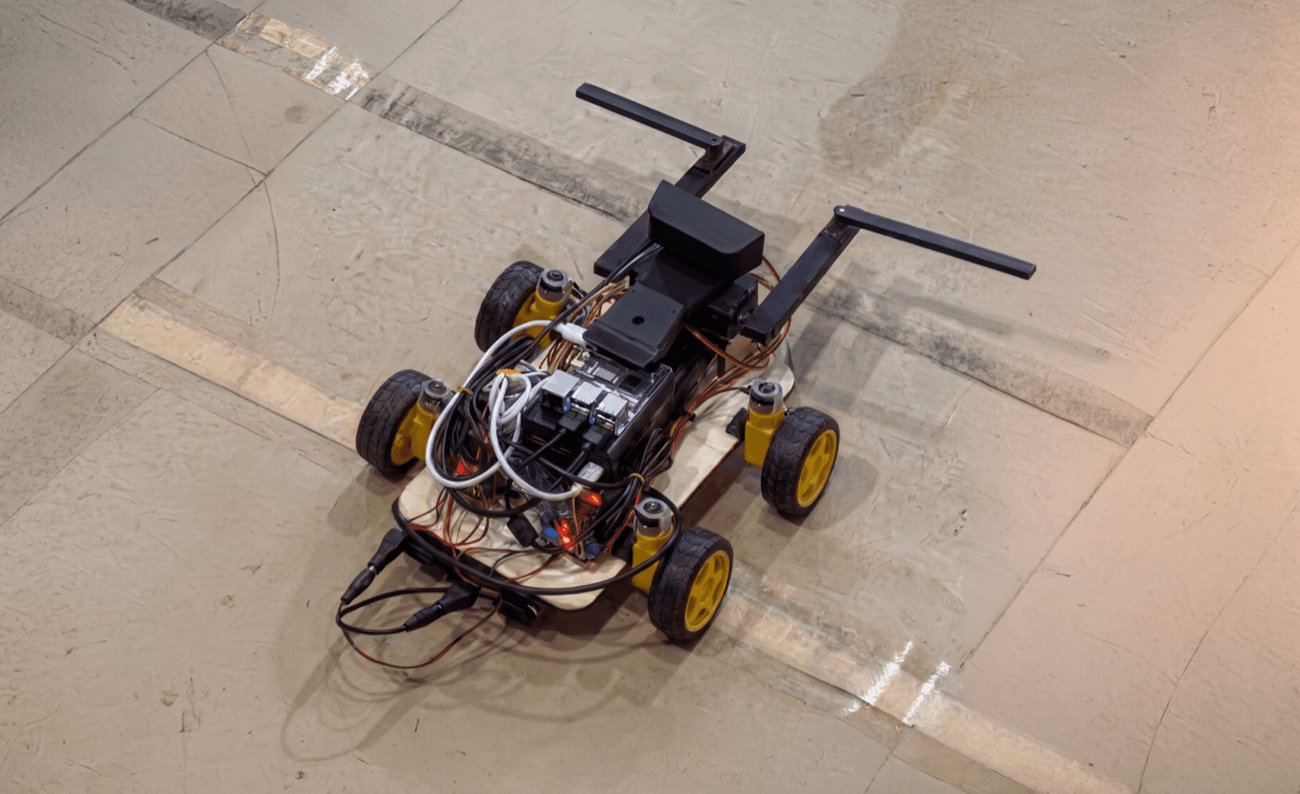 Trash collection robot chassis with robotic arm and electronics